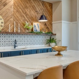 a kitchen with a table and chairs